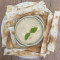 Hummus Layered With Pesto And Feta